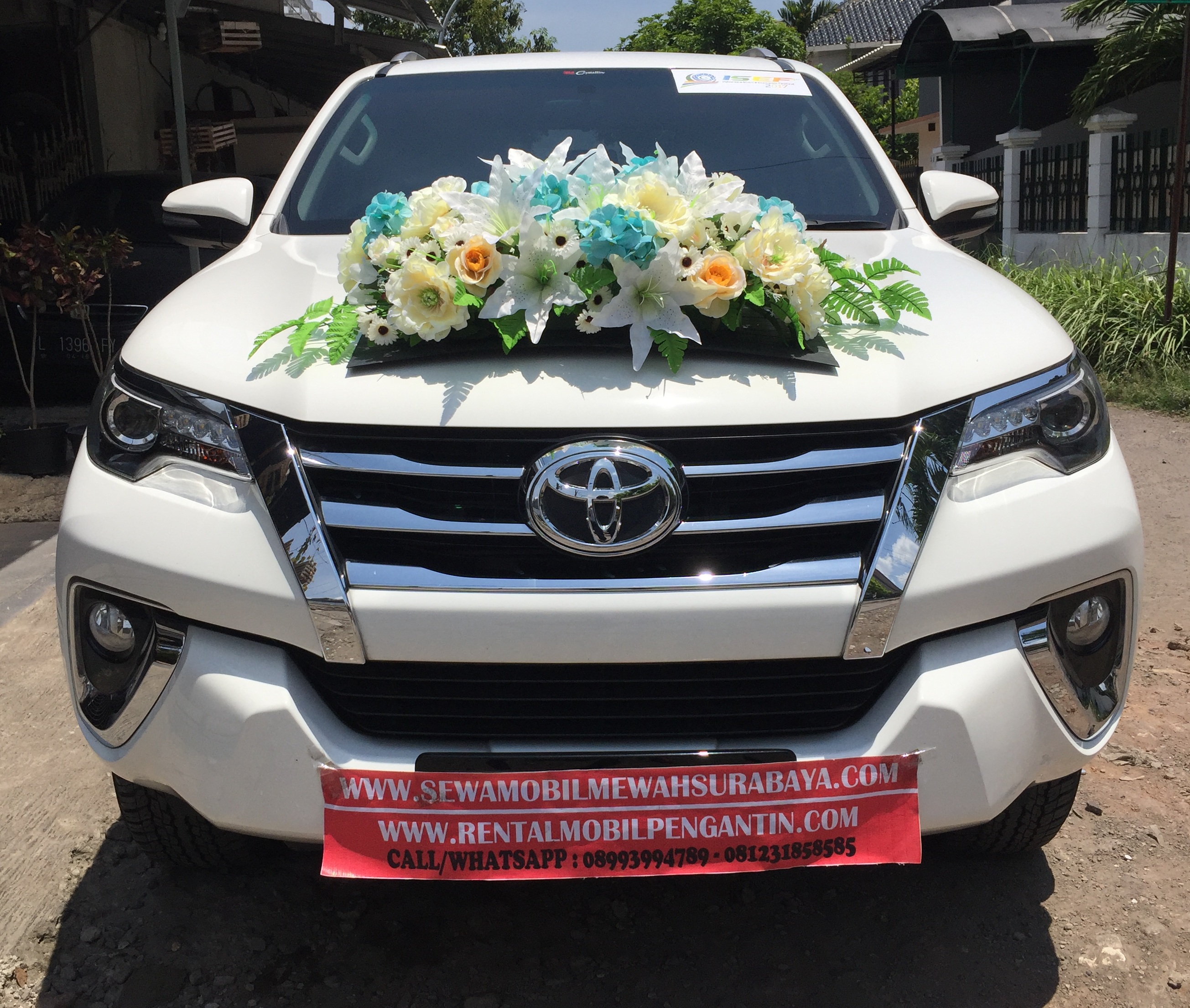 sewa mobil pengantin fortuner vrz putih
